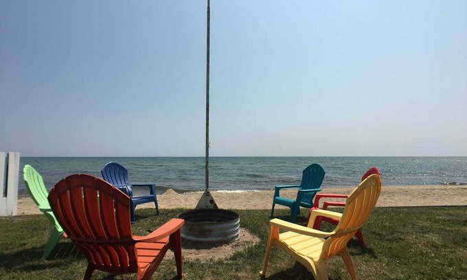 East Tawas Casa | Located on Lake Huron Sandy Beach! Home sleeps up to 9!
