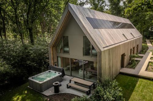 Zolder Villa | Lodge met Jacuzzi - 8 personen - Woodz Lodges