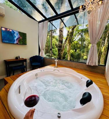 Carniel Casa | Loft com Hidromassagem e Piscina Privativa