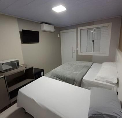 Centro Apartamento | Loft Lux 4 (Smart TV, Ar condicionado, Cozinha.)