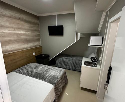 Esplanada Apartamento | Loft Lux SM 04 (Smart TV, Ar condicionado, Cozinha)