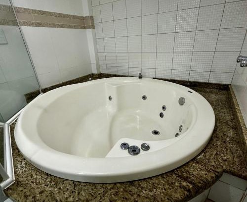 Esplanada Apartamento | Loft Lux SM 15 (Jacuzzi, Smart TV, Ar condicionado, Cozinha)