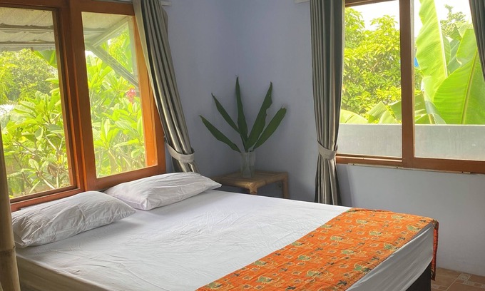 Mataram Casa | Lombok 3 bedroom tropical house with terrace. Beautiful mountain views.