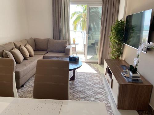 Taqah Apartamento | Lovely Beach Apartment