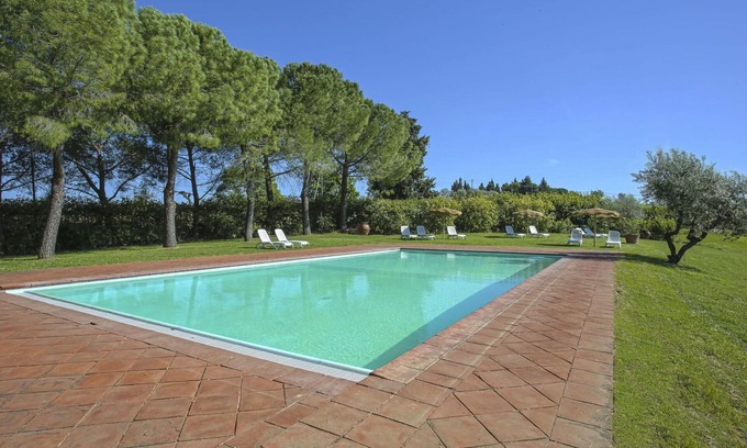 Tavarnelle Val di Pesa Apartamento | Apartamento con piscina, WIFI, TV, patio, mascotas permitida, vista panorámica, aparcamiento