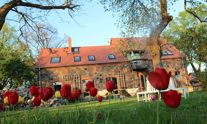 Klosterdorf Casa | Lovingly restored fieldstone barn with fireplace and woodchip heating.