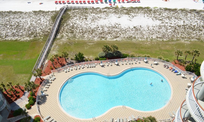 Navarre Beach Condominio | Hermoso frente a la playa, la piscina más grande, servicio de playa provisto por un nuevo vendedor.