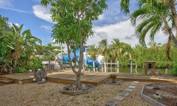 Eden Pines Casa | Lower Keys on quiet canal front w/boat lift, screened-in porch & Pets Welcome!