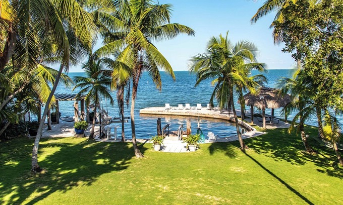 Islamorada Cabaña | Lush tropical plantings in a gated compound located directly on the Florida Bay