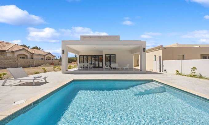 Gold Coast Villa | LUX 4BR and 3BA Villa with Pool at Malmokweg 48 by Bocobay