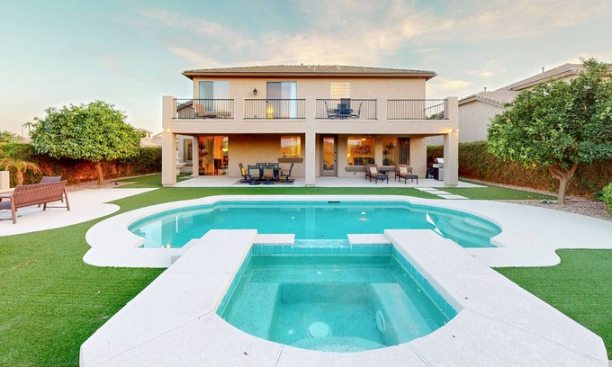 Seville Casa | Luxe snowbird-friendly haven with heated pool, gas fireplace, balcony, & firepit