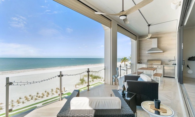 Mid Island Villa | Luxurious Beachfront Vacation Getaway | 4-Bedroom, 4.5-Bath w/ Heated Pool & Spa | Sleeps 12