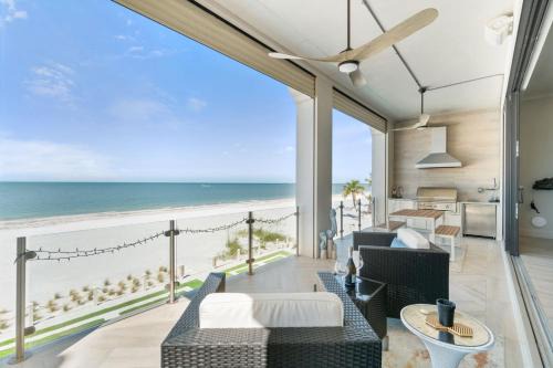 Mid Island Casa | Luxurious Beachfront Vacation Getaway, 4 Bedroom, 4 and half Bath w Heated Pool, Spa, Sleeps 12