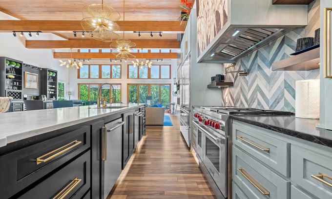 Mid America Casa | Luxurious Mountain Retreat with 4 King Ensuites, Hot Tub, Pool and Creek Views!