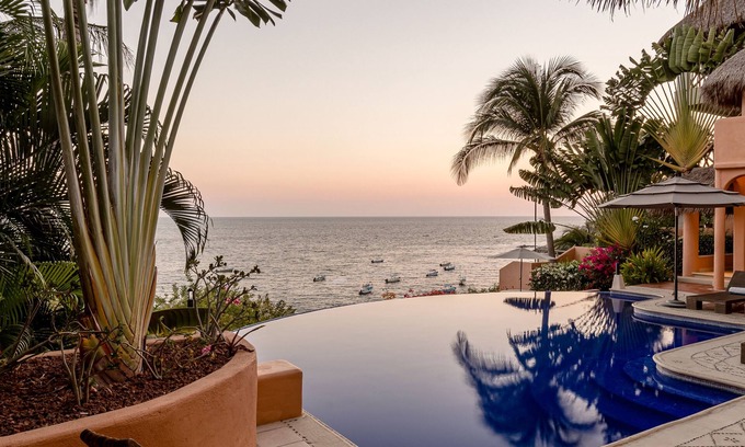 Hidalgo Casa | Lujosa Villa frente al mar - A pasos de Playa Manzanillo - La mejor vista en Puerto
