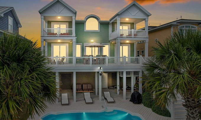Sunset Beach Casa | Luxurious Sunset Beach Home On The Water With Pool, Boat Dock and Golf Cart