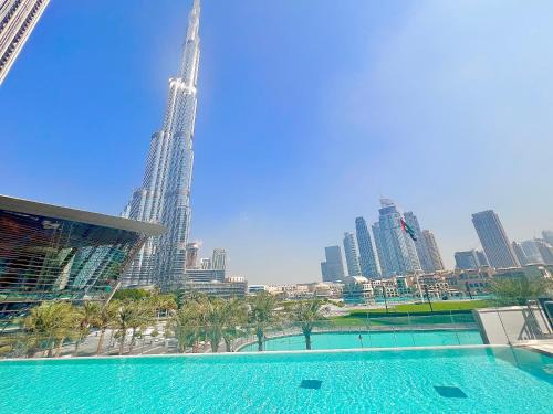 Downtown Dubai Apartamento | Luxury 1BR 5min to Dubai Mall Burj Khalifa View from pool