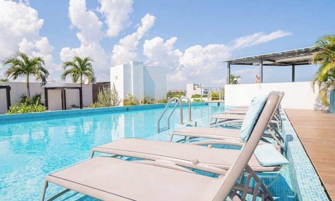 Área de la calle 12 Apartamento | Luxury 1BR with Stunning Poolside Terrace