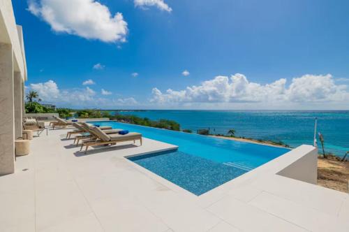 Sero Colorado Apartamento | Luxury Beachfront Oasis Infinity Pool Hot Tub BBQ-TLS