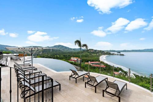 Playa Flamingo Casa | Luxury Condo with Panoramic Ocean Views, Sparkling Infinity Pool, and Modern Open-Concept Design