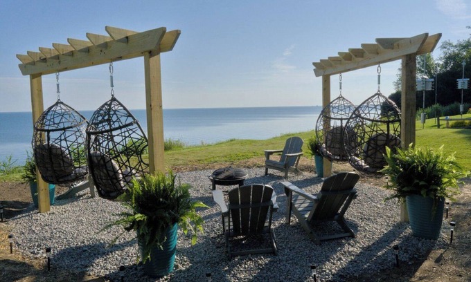 Ashtabula Casa | Luxury Lakefront Retreat: Panoramic Views, Game Room, Fire Pit Swings & More