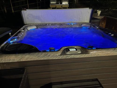 East Stroudsburg Casa | Luxury Pocono Retreat with hot tub, sauna, fire pit, and patio