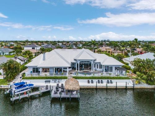 Pelican Casa | Luxury Resort-Style Saltwater Pool Home in SW Cape Coral