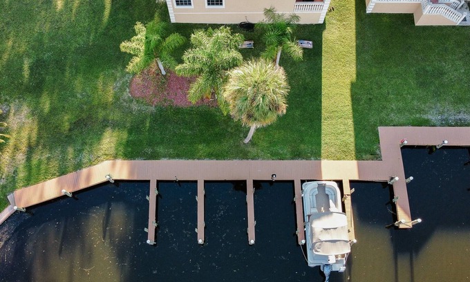 Homosassa Casa | Luxury River Home w/boat ramp, dock, parking, EV Charger & golf cart!