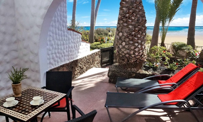 Bahia Calma Casa | Estudio de lujo para amantes de la playa - apartamento junto al mar bajo palmeras