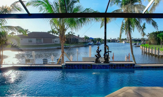 Burnt Store Isles Casa | Luxury Tropical long waterfront view w/bikes,kayaks,golf clubs,beach gear incl.