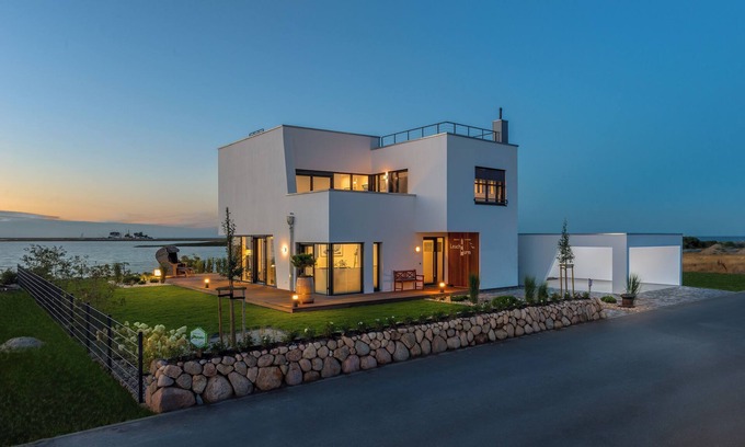 Olpenitz Casa | Faro - 1 Ubicación, azotea, Schleiblick, cochera, chimenea, sauna, terraza, silla de playa, persianas exteriores, mosquiteras