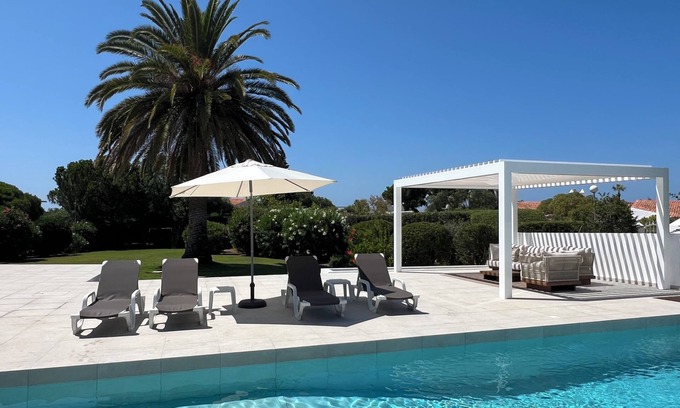Mato Serrao Villa | Villa de lujo en Carvoeiro con piscina climatizada, vistas fantásticas al mar y Gran Jardín