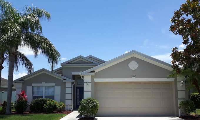Sabal Harbour Villa | Villa de lujo con gran piscina y frente al lago. Cerca de parques y playas de Disney