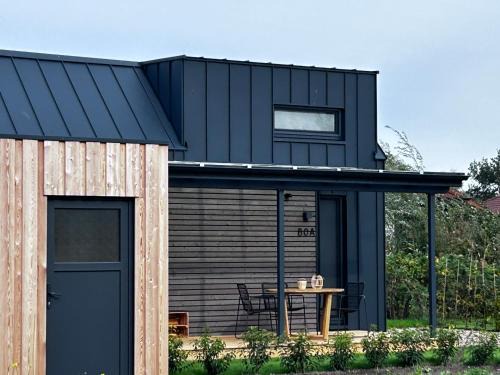 Sehestedt Casa | Lykke Huus Tinyhaus am Meer mit Fasssauna