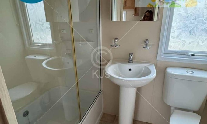 Towyn Casa | Lyons Winkups Holiday, 4 bedrooms - sleeps 10 pet friendly, large decking area