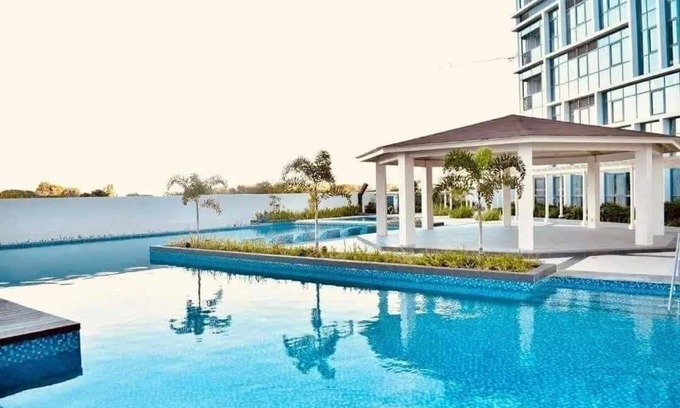 Lapu-Lapu Complejo | MACTAN NEWTOWN 1-BEDROOM W/ BALCONY & POOL ACCESS