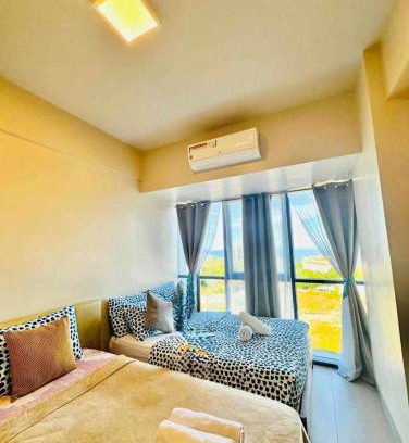 Lapu-Lapu Apartamento | MACTAN NEWTOWN FAMILY ROOM Deluxe with free wi-fi, POOL & GYM