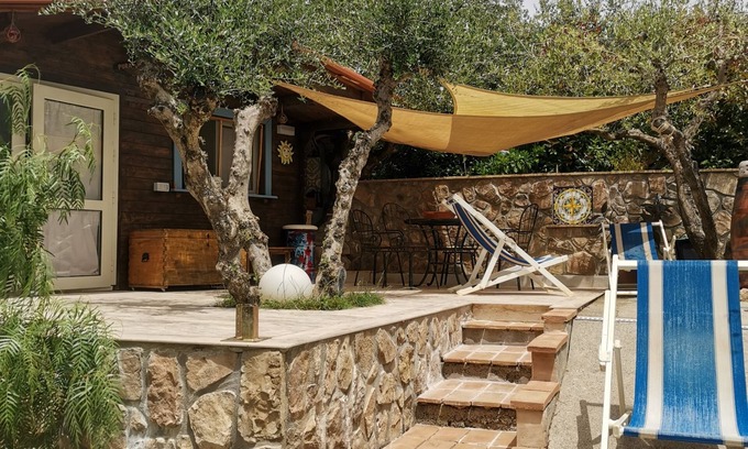 Orbetello Cabaña | Magnificent cottage surrounded by olive trees and aromatic plants.