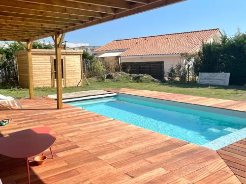 Biscarrosse Villa | Maison avec piscine et jardin privatifs - un séjour au calme