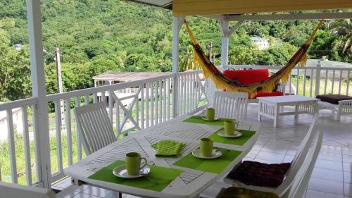 Bas Vent Casa | Maison de charme avec vue sur mer à Bas Vent - Confort optimal
