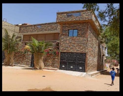 Mbour Casa | Maison Manour chambre 'soft breeze'