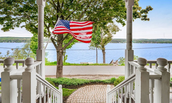 Town of Milo Casa | Majestic lakefront home with game room & fireplace - dog-friendly