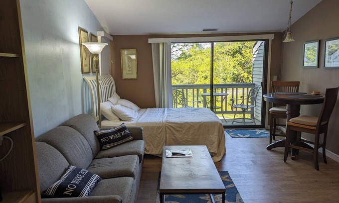 Acme Condominio | Hacer recuerdos en Grand Traverse East Bay.