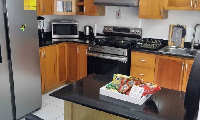 Mango Walk Casa | Mango Retreat in Mango Walk Country Club...Entire house with pool in Montego Bay