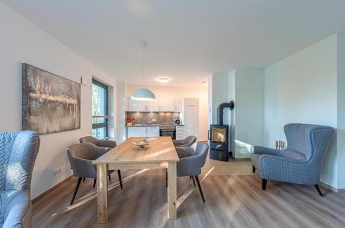 Krakow am See Apartamento | Mantra-Oase - Gemütliches Apartment mit Seeblick, Kamin & Wellness am Krakower See