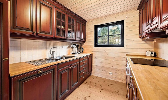 Vradal Casa | Marit's Hytte is a typical Norwegian holiday home, suitable for 6 to 8 people. Enjoy the fantastic view from the spacious veranda of this house.