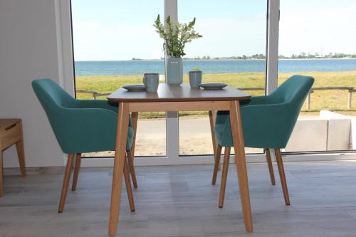 Fehmarnsund Apartamento | Meerblick Fehmarnsund 1 - direkt am Strand