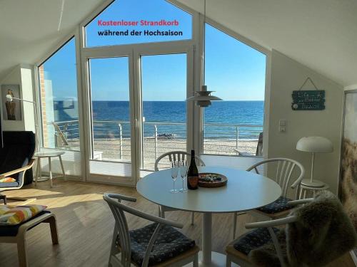 Hohwacht Apartamento | Meeresblick-Strandkorb-Haus-3-WE-46