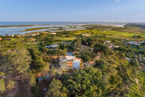 Tavira Villa | Meia Lua - Your Private Artsy Paradise Overlooking the Ria Formosa with pool and sea views near Barril beach, Tavira