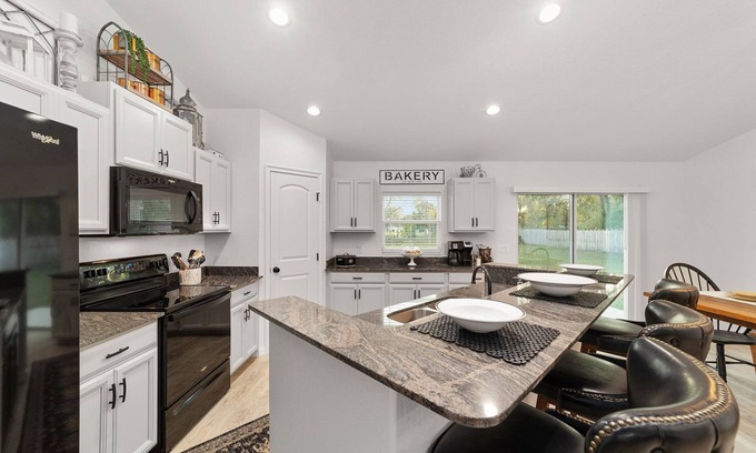 Candler Casa | Mexican themed LARGE home walking distance to private lake! Fish swim and play!!